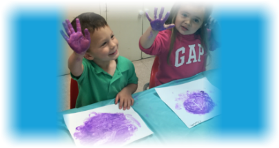 young kids with painted hands